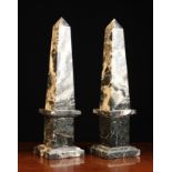 A Pair of Bardiglio Marble Obelisks 18¾ ins (48 cms) in height.