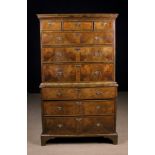 A 18th Century Figured Walnut Veneered Chest on Chest.