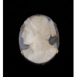 A Carved Hardstone Cameo Brooch on a gold mount.