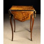 A 19th Century Marquetry Table à Canapé with gilt metal mounts in the Louis XV Style .