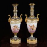 A Pair of Porcelain & Champlève Enamelled Vases.