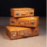 A Set of Three Graduated Height-adjustable Travel Cases,