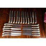 A Set of Twelve Silver Pistol-Handled Dinner Knives & Twelve Side Knives by Hunt & Roskell Ltd.
