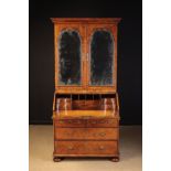 A George I Burr Elm & Walnut Bureau Cabinet.