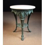 A 19th Century Cast Iron Garden Table painted green.