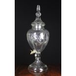 A Large Irish Cut Glass Urn-Shaped Whiskey Dispenser with a finialed lid,
