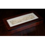 A Fine 18th Century Carved Ivory Plaquette carved with revelling Bacchanalian cherubs,