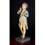 A Goldscheider Painted Terracotta Figure of Le Petit Marquis, signed and numbered 17½ ins (24.