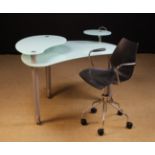 A Contemporary Cattelan Italia Desk and a Kartell Maui Swivel Chair.