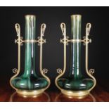 A Pair of Late 19th Century Dark Green Streaked Glaze Garniture Vases having tall cylindrical necks