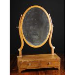 An Edwardian Mahogany Swing Dressing Mirror.