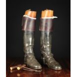 A Pair of Fine Gentleman's Leather Riding Boots with spurs, on wooden trees,