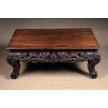 A Low Chinese Carved Hardwood Table.