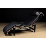 A Charles Le Corbusier Style Black Leather and Chrome Chaise Longue, 63 ins (160 cms) in length,
