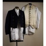 An Antique Gentleman's Ivory Silk Waistcoat embroidered in silver threads with sprigs and sprays of