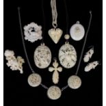 A Collection of 19th Century Carved Ivory Jewellery: Two Chinese pierced oval pendants intricately