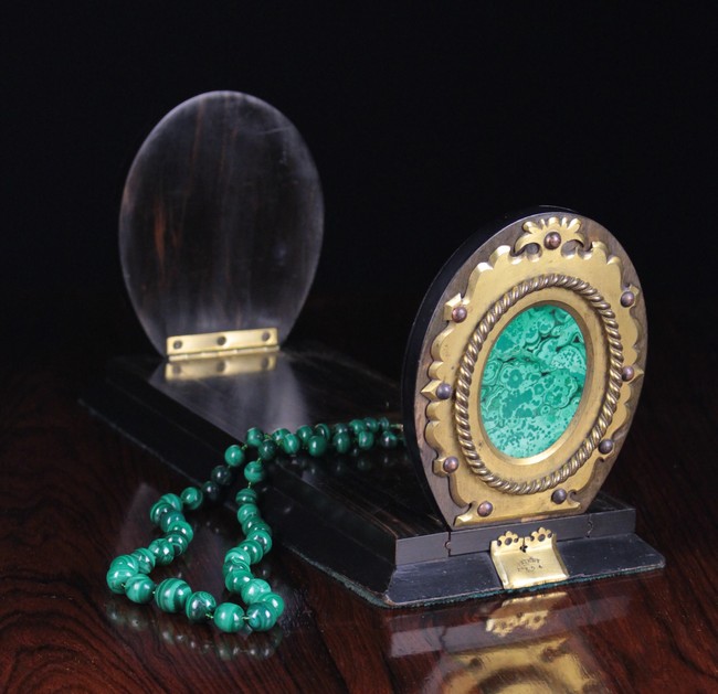 A Fine 19th Century Betjemann's Coromandle Sliding Book Holder having decorative gilt bronze mounts