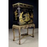 A Chinoiserie Black Lacquered Cocktail Cabinet on Stand.