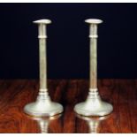 A Pair of 18th Century Brass Ejector Candlesticks.