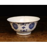 A Qianlong Blue & White Bowl (A/F) decorated with flowers and foliage,