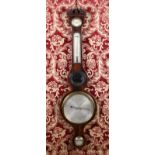 A 19th Century Mahogany Wheel Barometer inlaid with stringing, by P Gandola London.