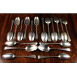 Twelve 18th Century London Silver Table Spoons and Six Later Tablespoons with Sheffield hallmarks: