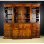 A Large Regency Style Mahogany Break-front Bookcase with secretaire drawer.