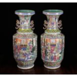 A Pair of Fine 19th Century Cantonese Vases decorated in polychrome enamels with figural panels