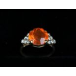 A Striking Fire Opal & Diamond Ring.