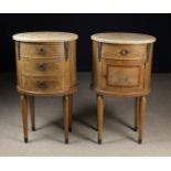 A Pair of Louis XVI Style Marble-topped Bedside Cabinets of oval form with decorative inlay.