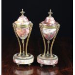 A Pair of Small 19th Century Rouge Royal Marble Cassolettes with gilt metal mounts,