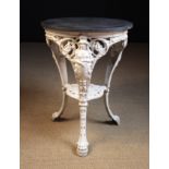 A 19th Century Cast Iron 'Brittania' Garden Table painted white.