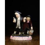 A 19th Century Staffordshire Figure Group; Vicar & Moses, on a scrolling base,