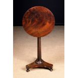 A Regency Tilt-top Wine Table.