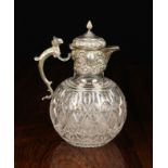An Attractive Cut Glass Claret Jug with Silver Mounts hallmarked London 1895 with Andrew Crespel