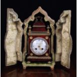 A Pretty 19th Century Louis XVI Style Mantel Clock housed in an ogee topped case clad in silk