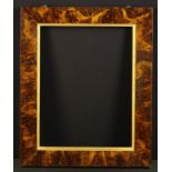 A 19th Century Burr Walnut Picture Frame with a moulded gilt wood liner and suspension ring to the