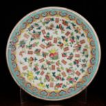 A Chinese Plate decorated in polychrome enamels with sprigs of flowers, peaches and kites,