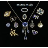 A Collection of Brooches and Necklaces set with blue stones to include sapphires,