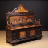 A 19th Century Italian Renaissance Style Ivory-Inlaid & Marquetried Walnut Cassapanca.