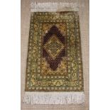A Small Rug woven in silky pale brown,