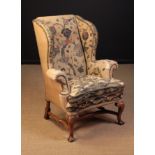 A Late 19th/Early 20th Century Queen Anne Style Wing Armchair.