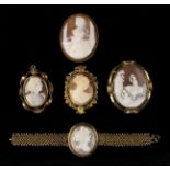 A Good Collection of Five Victorian Carved Shell Cameos: Two brooches;