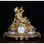 A 19th Century French Ormolu Mantel Clock with Sèvres Porcelain Insets.