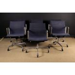 A Set of Six 20th Century Eames Type Aluminium Group Swivel Chairs with slate blue slung seats,