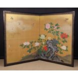 A Large Chinese Bi-fold Screen painted with peonies and rock-work on a gilded ground with decoupage