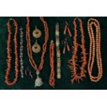 Three Antique Coral Necklaces, a coral bracelet, a string of coral beads,