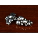 A Sterling Silver Pendant Brooch by Georg Jensen Denmark, fashioned as a bunch of grapes.