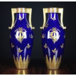 A Pair of Jagetet Pinon Tours Twin-handled Vases.