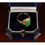 An Attractive 18 Carat Gold and Jade Ring.